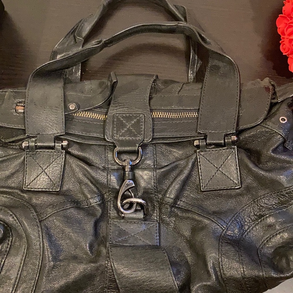 Black distressed leather crossbody bag